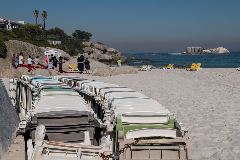 Chairs laid out on Cape Town beach by JK Vending.