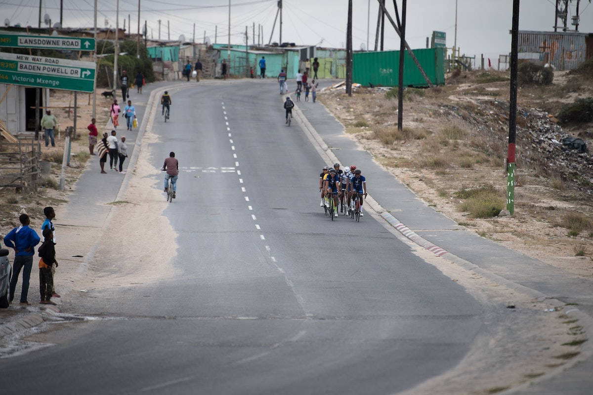 Cyclists from Velokhaya Cycling Academy cycling through Khayelitsha.