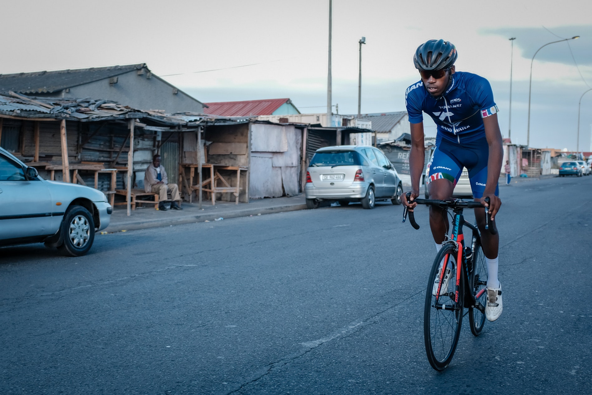 Loyiso Fulu of Velokhaya cycling through Khayelitsha.