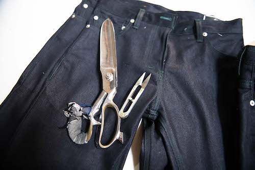 Scissors and a pair of jeans.